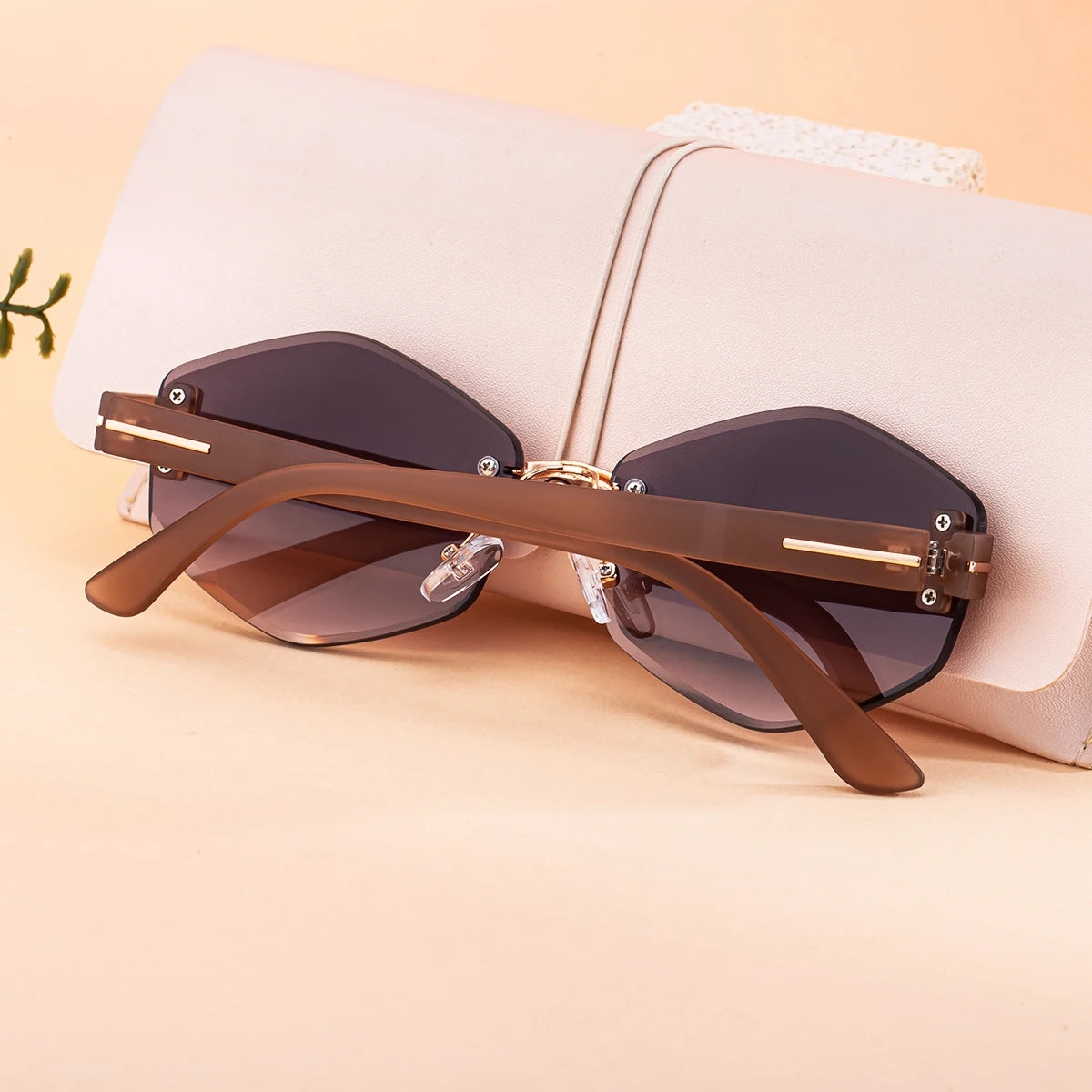 Designer Rimless Polygonal Shaped UV400 Sunglasses for Women